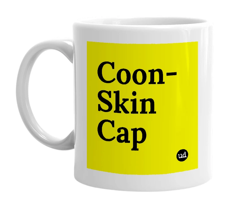 White mug with 'Coon-Skin Cap' in bold black letters