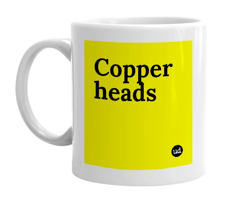 White mug with 'Copper heads' in bold black letters