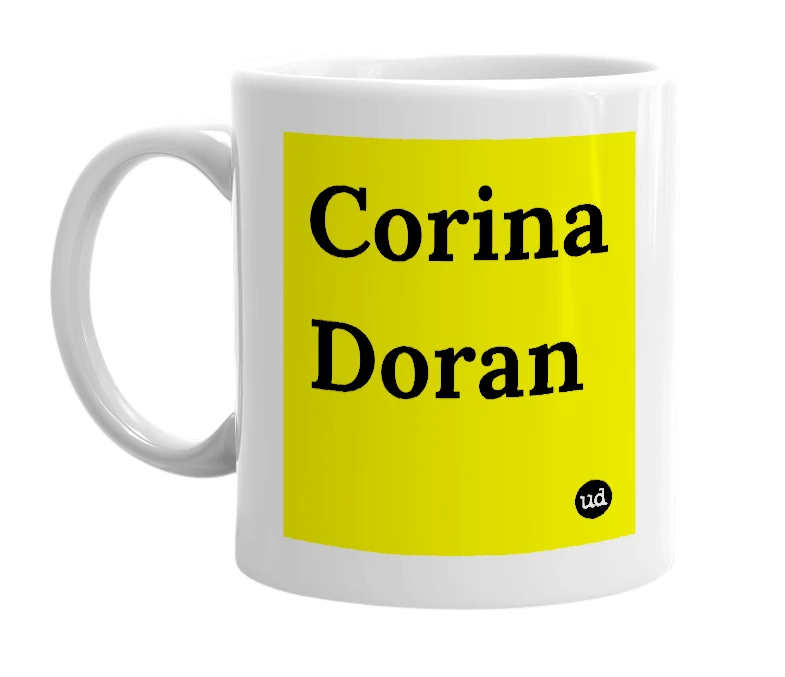 White mug with 'Corina Doran' in bold black letters