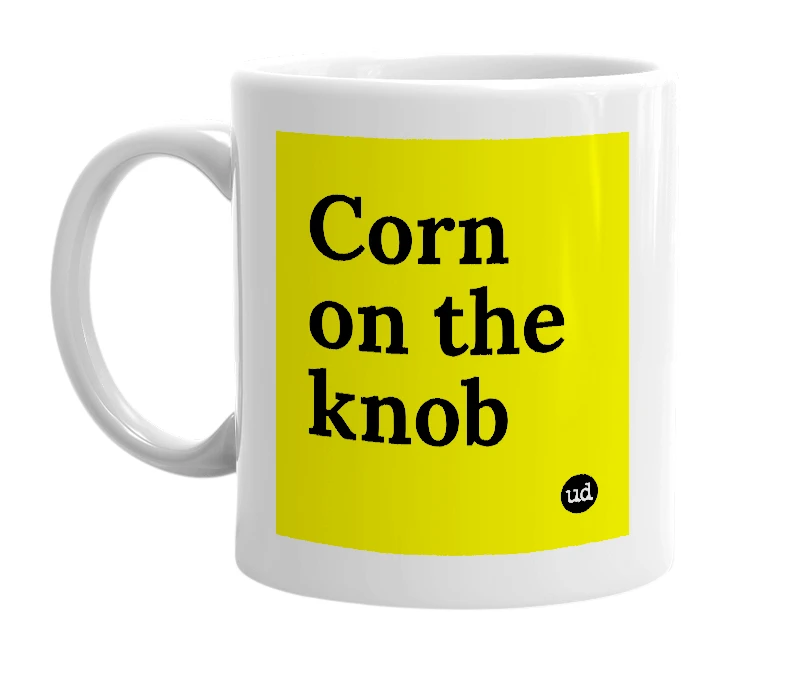 White mug with 'Corn on the knob' in bold black letters