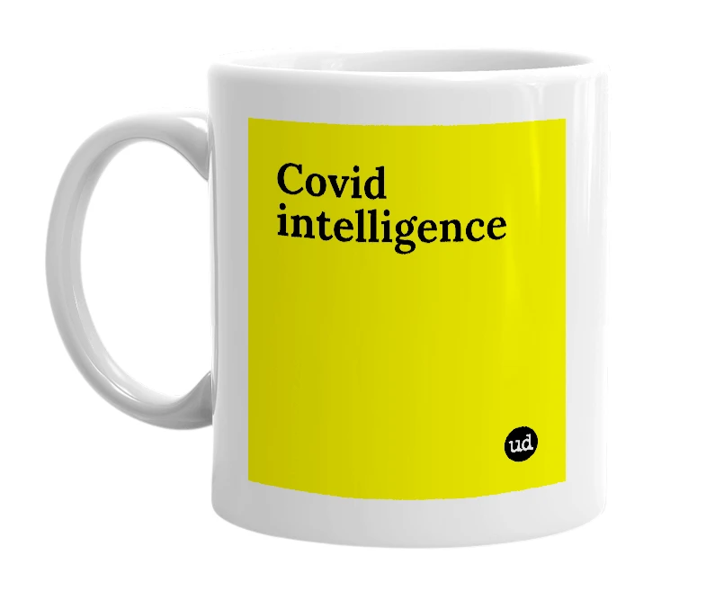 White mug with 'Covid intelligence' in bold black letters