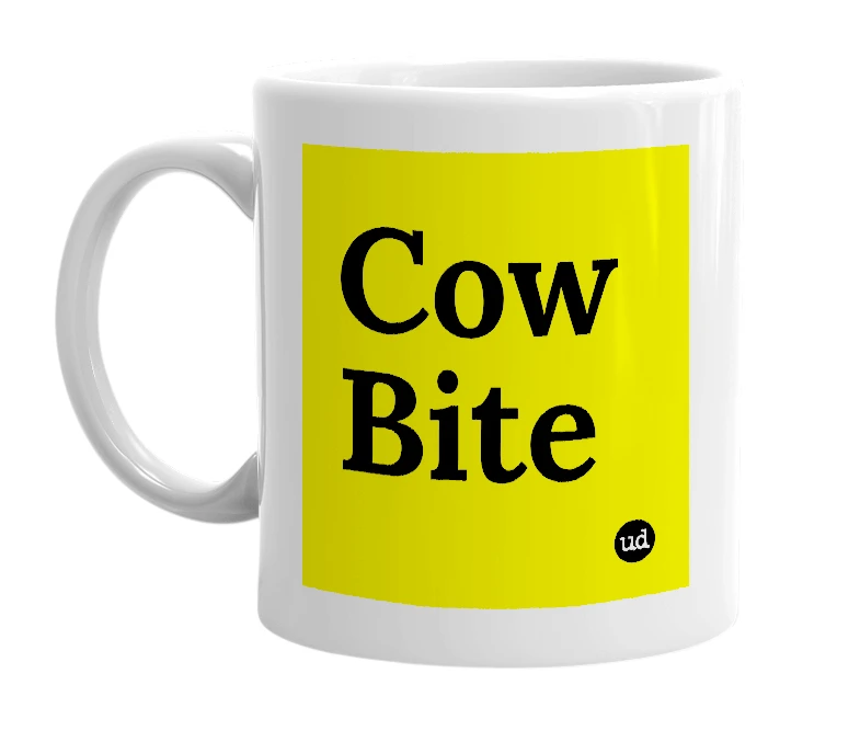 White mug with 'Cow Bite' in bold black letters