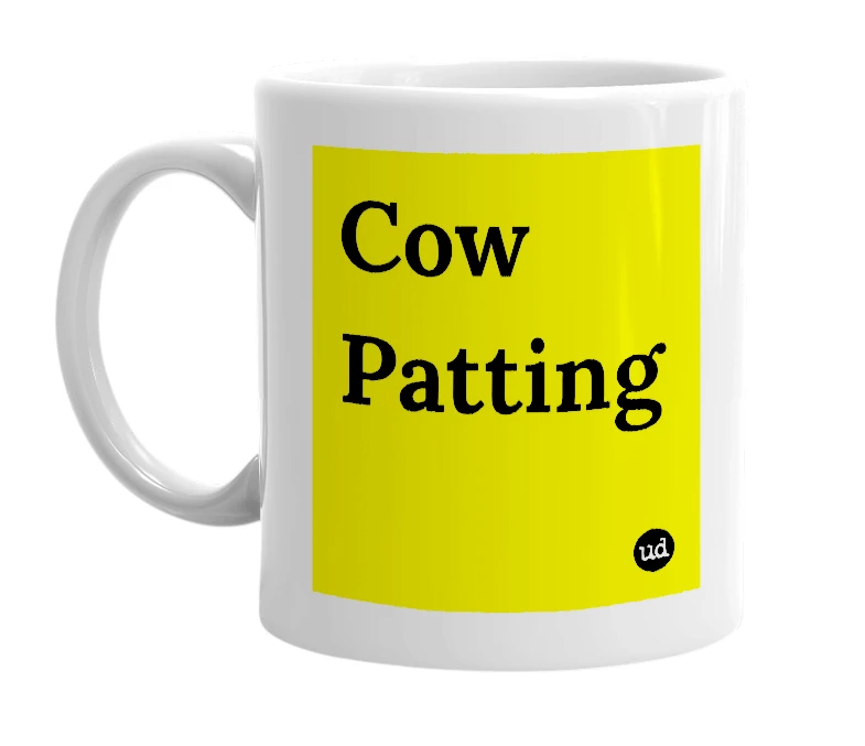 White mug with 'Cow Patting' in bold black letters