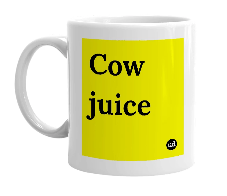 White mug with 'Cow juice' in bold black letters