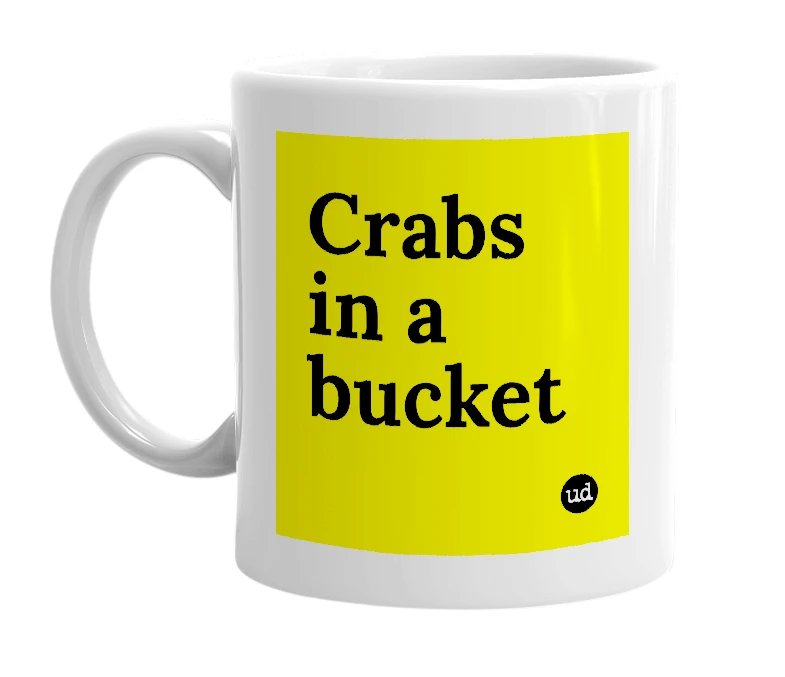 White mug with 'Crabs in a bucket' in bold black letters