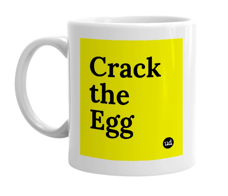 White mug with 'Crack the Egg' in bold black letters