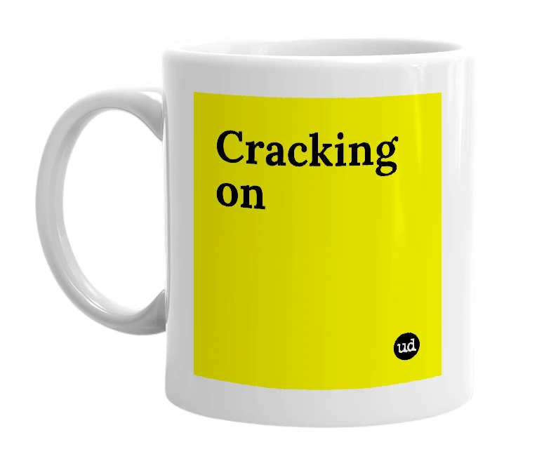 White mug with 'Cracking on' in bold black letters