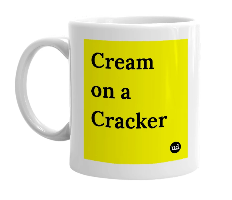 White mug with 'Cream on a Cracker' in bold black letters