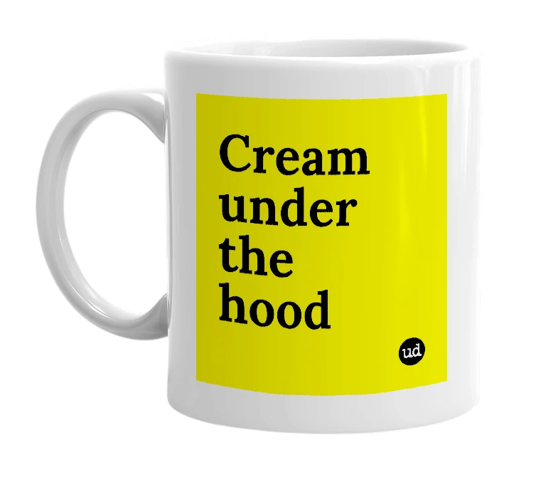 White mug with 'Cream under the hood' in bold black letters