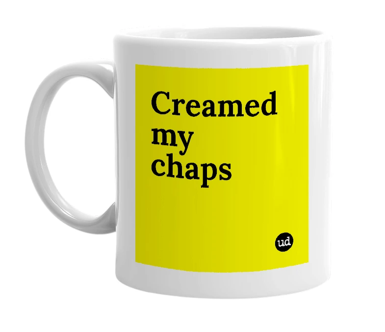 White mug with 'Creamed my chaps' in bold black letters
