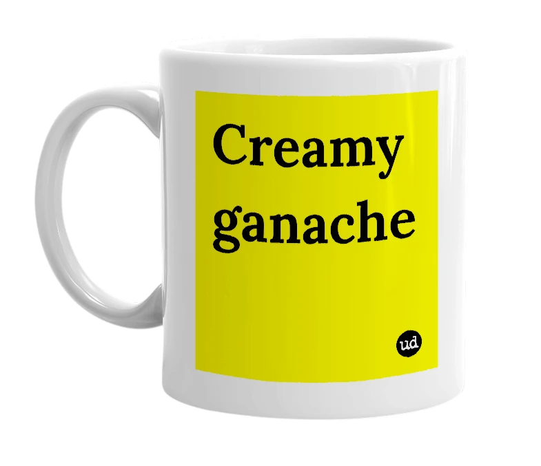 White mug with 'Creamy ganache' in bold black letters