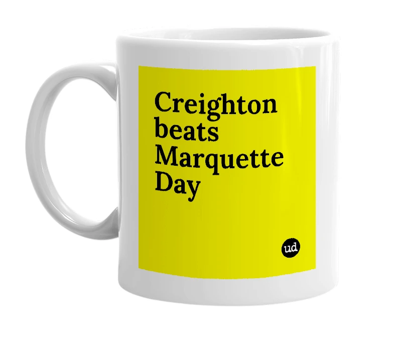 White mug with 'Creighton beats Marquette Day' in bold black letters