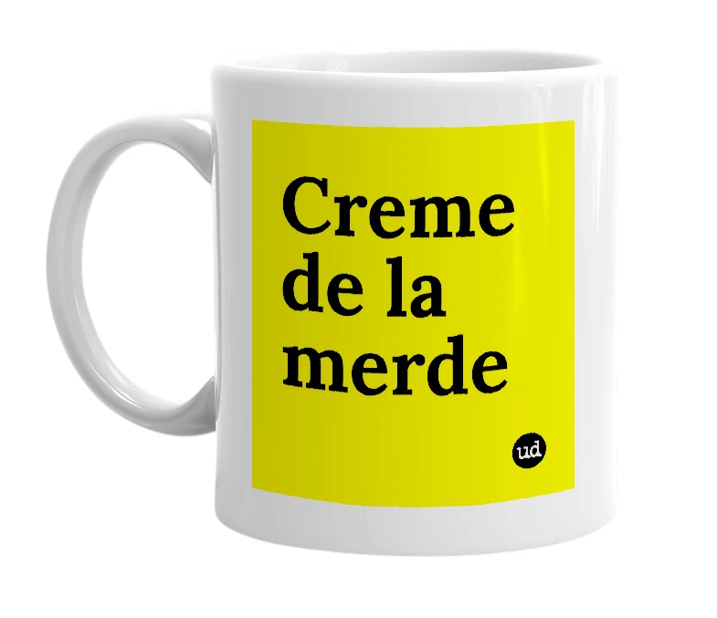 White mug with 'Creme de la merde' in bold black letters