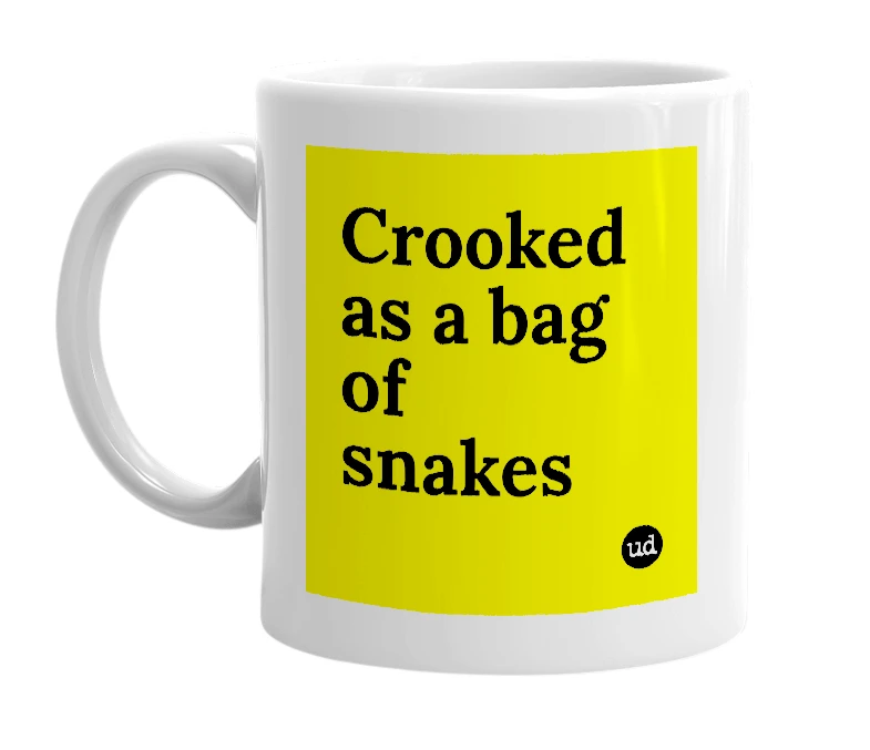 White mug with 'Crooked as a bag of snakes' in bold black letters