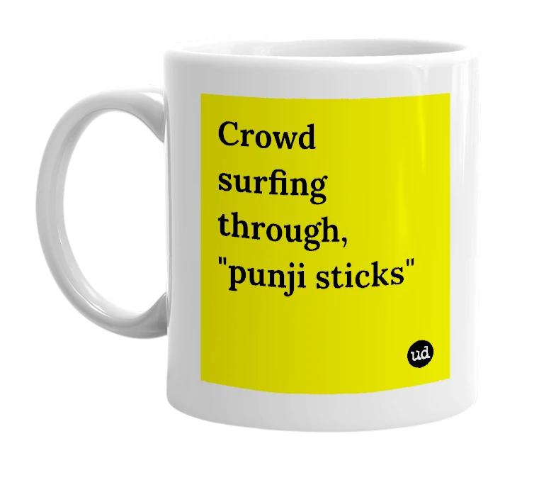 White mug with 'Crowd surfing through, "punji sticks"' in bold black letters