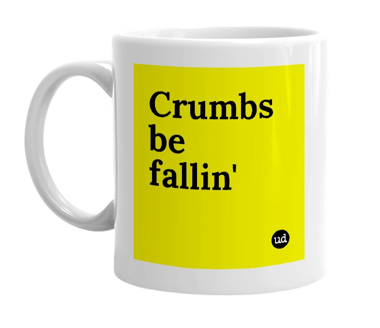 White mug with 'Crumbs be fallin'' in bold black letters