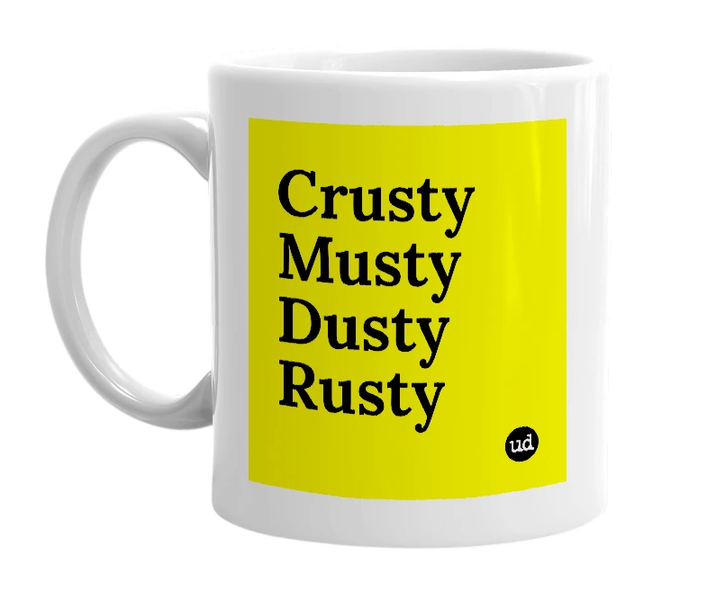 White mug with 'Crusty Musty Dusty Rusty' in bold black letters