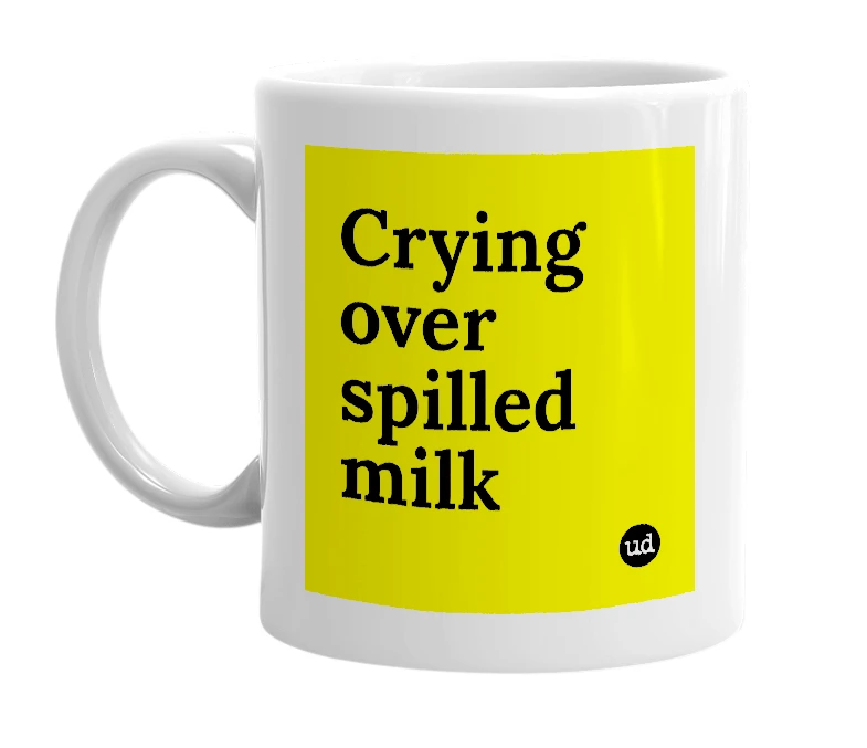 White mug with 'Crying over spilled milk' in bold black letters