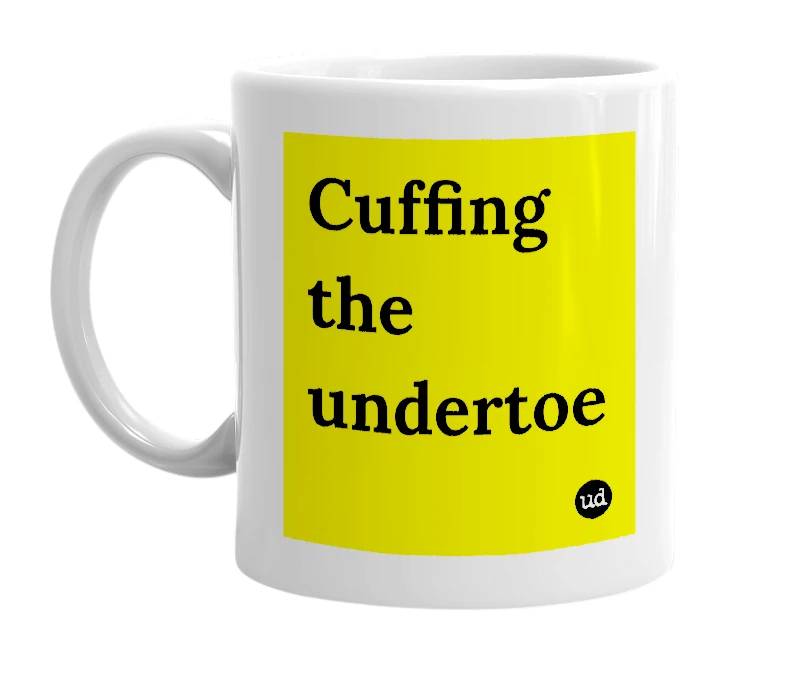 White mug with 'Cuffing the undertoe' in bold black letters