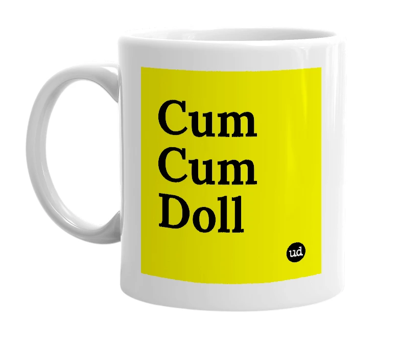 White mug with 'Cum Cum Doll' in bold black letters