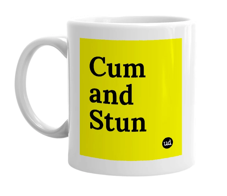 White mug with 'Cum and Stun' in bold black letters