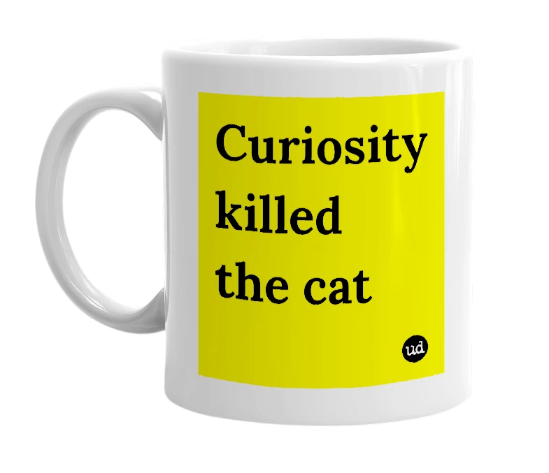 White mug with 'Curiosity killed the cat' in bold black letters
