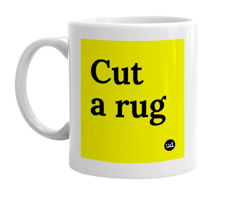 White mug with 'Cut a rug' in bold black letters