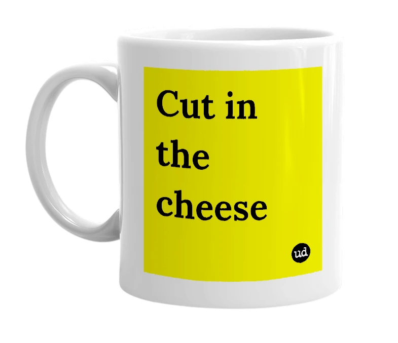 White mug with 'Cut in the cheese' in bold black letters