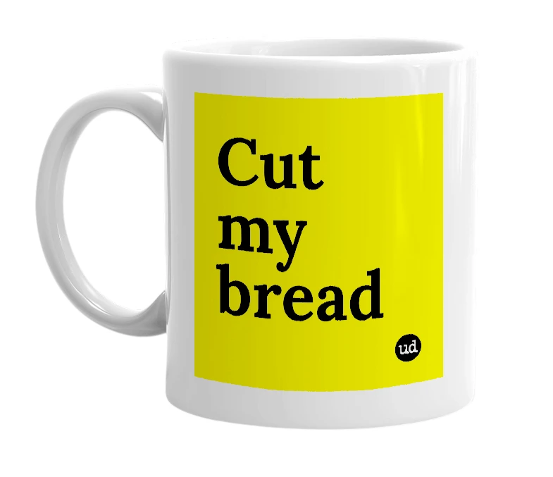 White mug with 'Cut my bread' in bold black letters