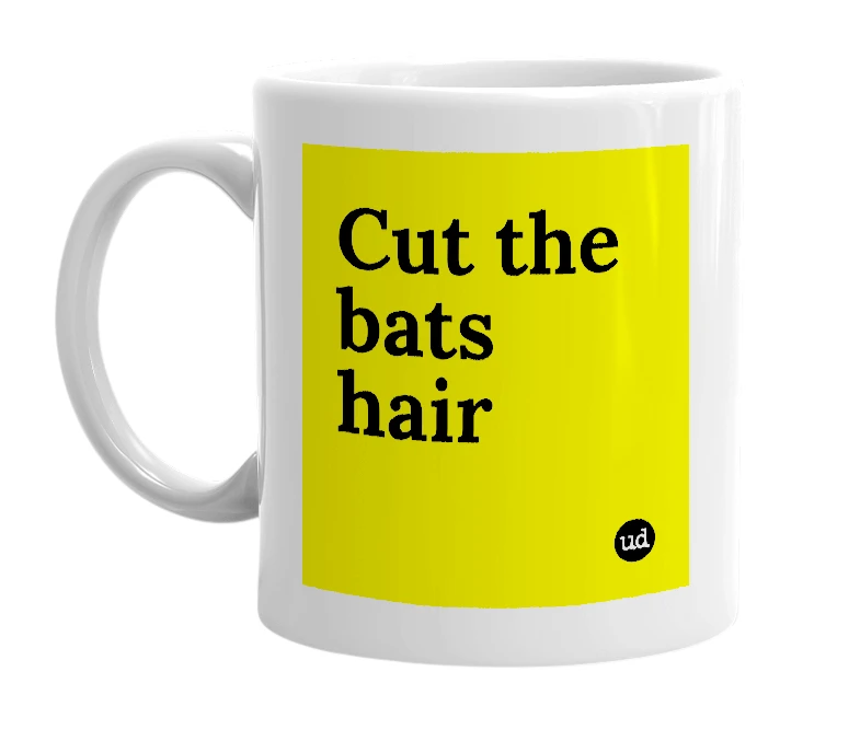 White mug with 'Cut the bats hair' in bold black letters