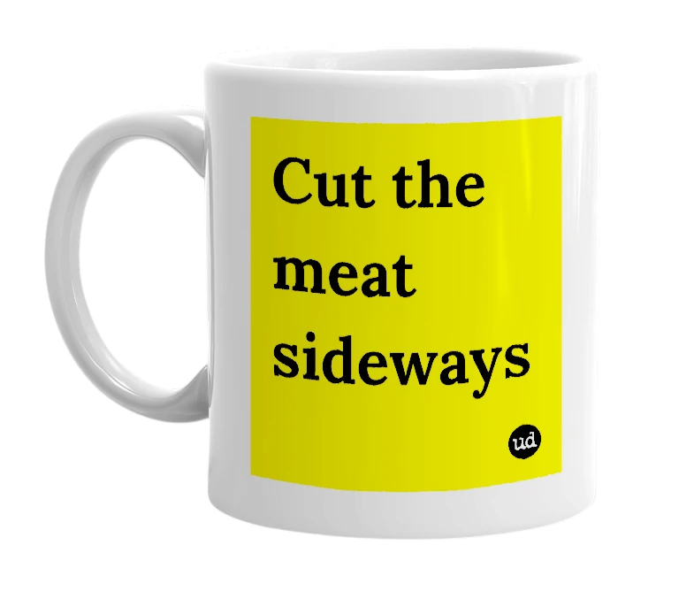 White mug with 'Cut the meat sideways' in bold black letters