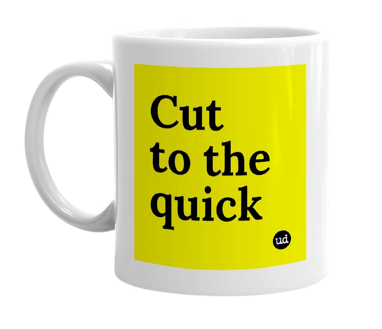 White mug with 'Cut to the quick' in bold black letters