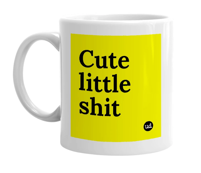White mug with 'Cute little shit' in bold black letters