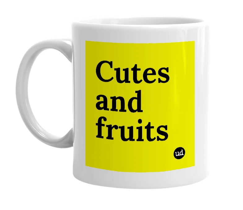 White mug with 'Cutes and fruits' in bold black letters