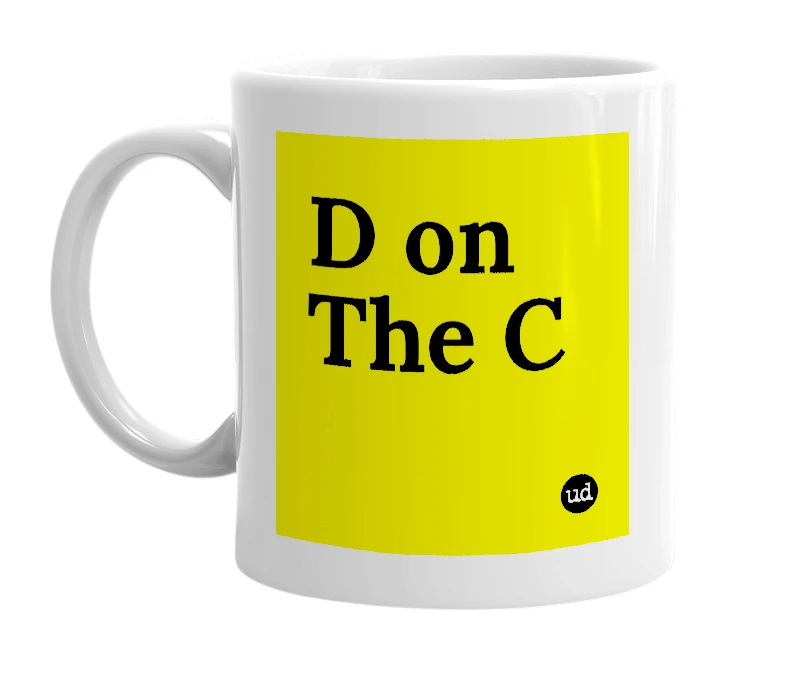 White mug with 'D on The C' in bold black letters