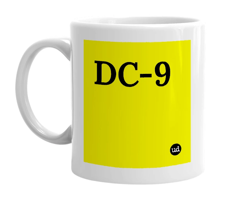 White mug with 'DC-9' in bold black letters