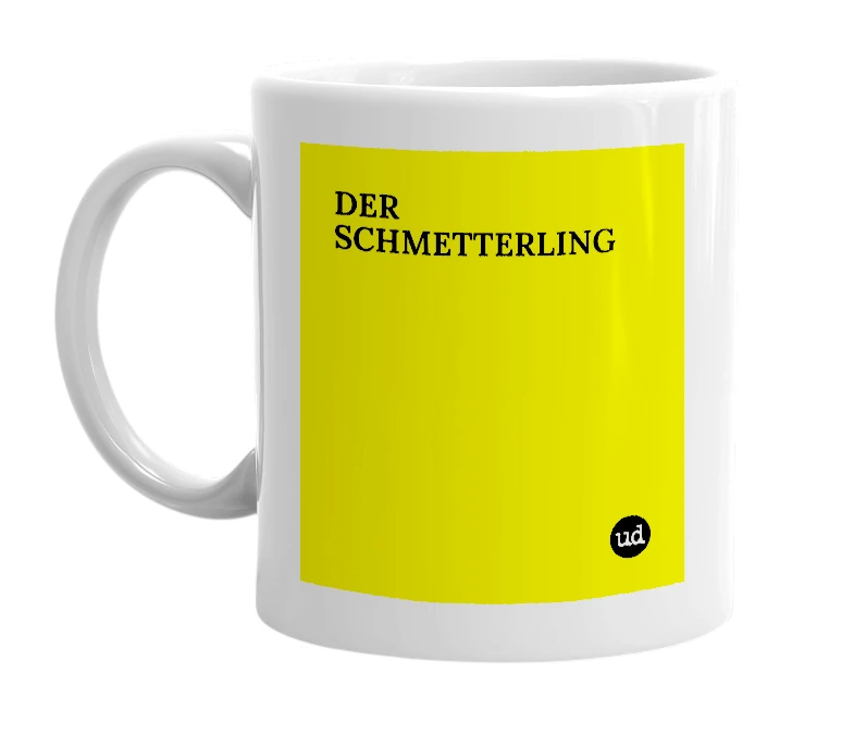 White mug with 'DER SCHMETTERLING' in bold black letters