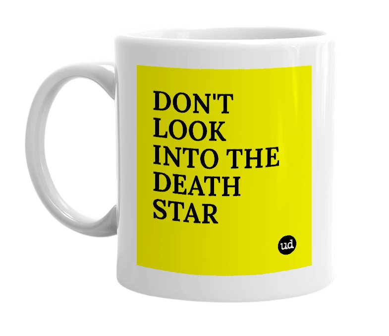 White mug with 'DON'T LOOK INTO THE DEATH STAR' in bold black letters