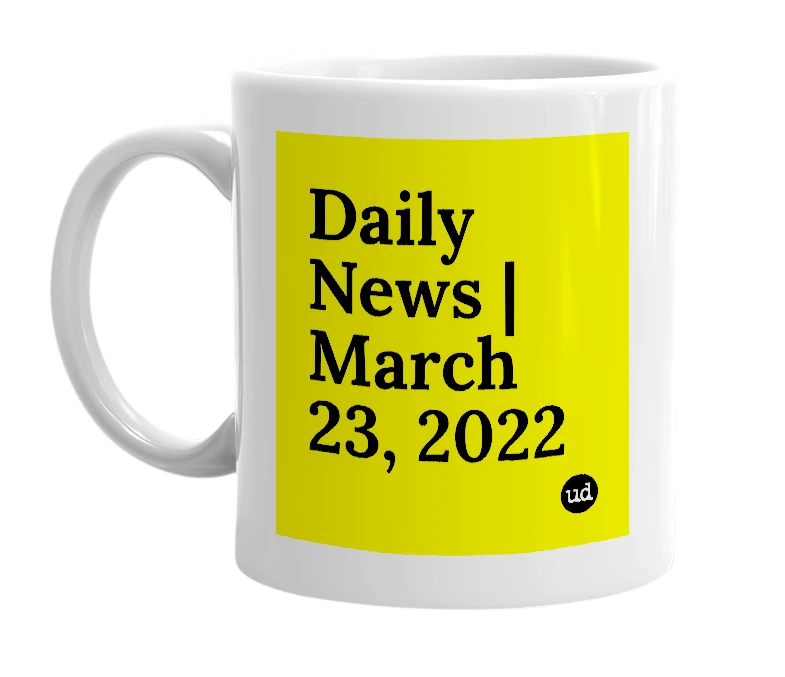 White mug with 'Daily News | March 23, 2022' in bold black letters