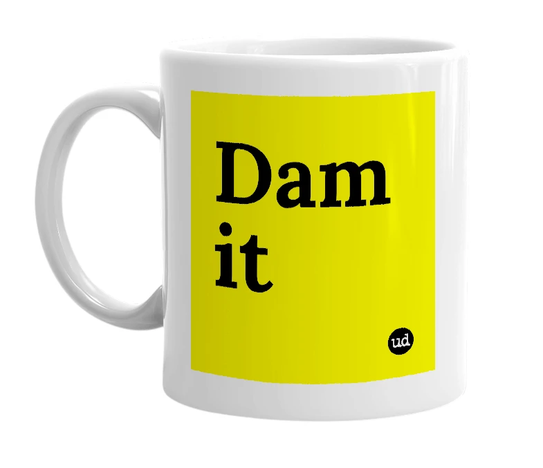 White mug with 'Dam it' in bold black letters