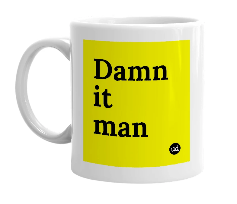 White mug with 'Damn it man' in bold black letters