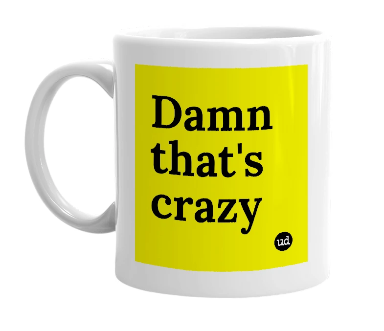White mug with 'Damn that's crazy' in bold black letters