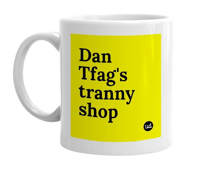 White mug with 'Dan Tfag's tranny shop' in bold black letters