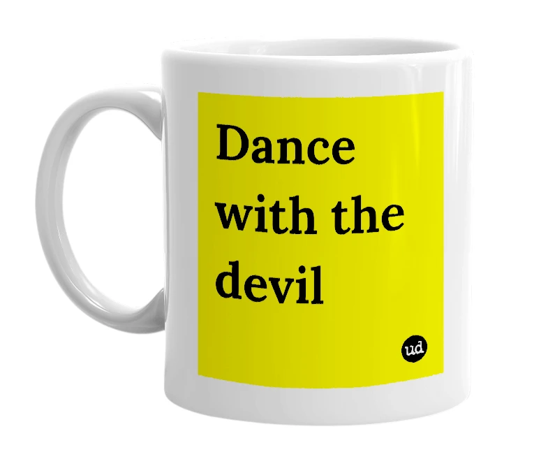 White mug with 'Dance with the devil' in bold black letters
