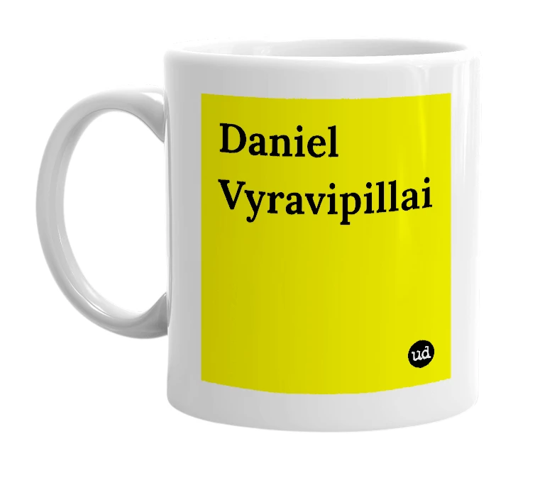 White mug with 'Daniel Vyravipillai' in bold black letters
