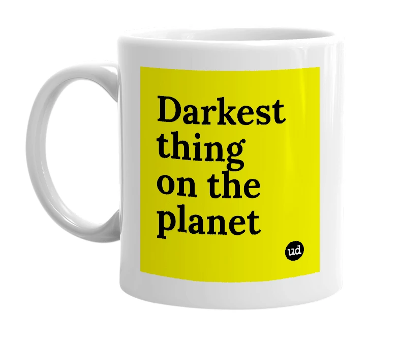 White mug with 'Darkest thing on the planet' in bold black letters