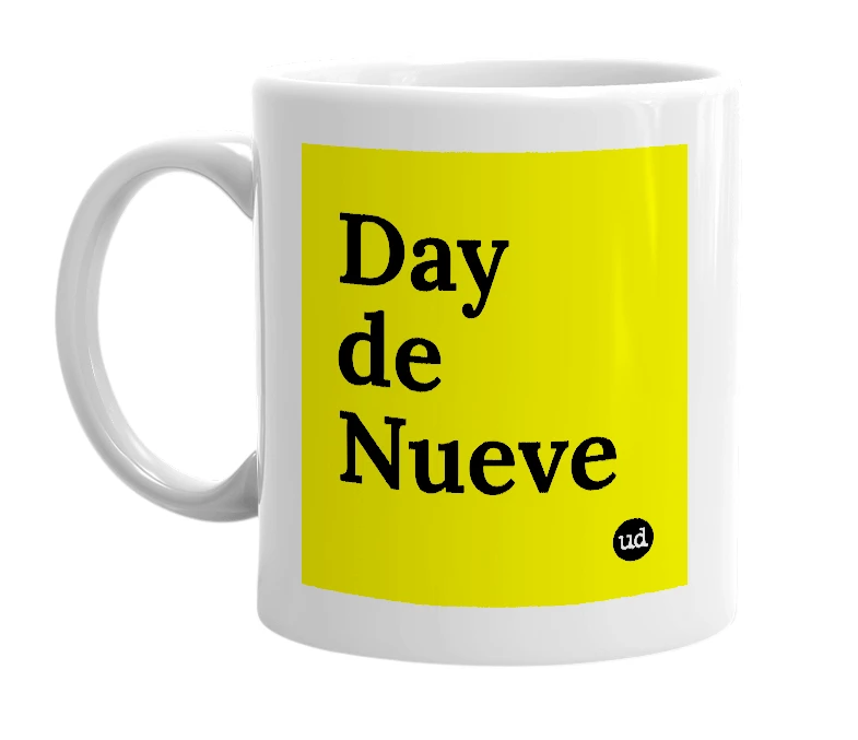 White mug with 'Day de Nueve' in bold black letters