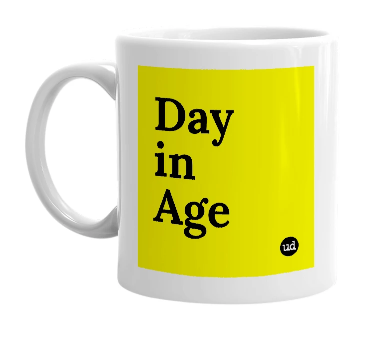 White mug with 'Day in Age' in bold black letters