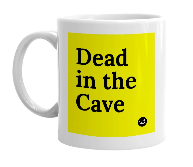 White mug with 'Dead in the Cave' in bold black letters