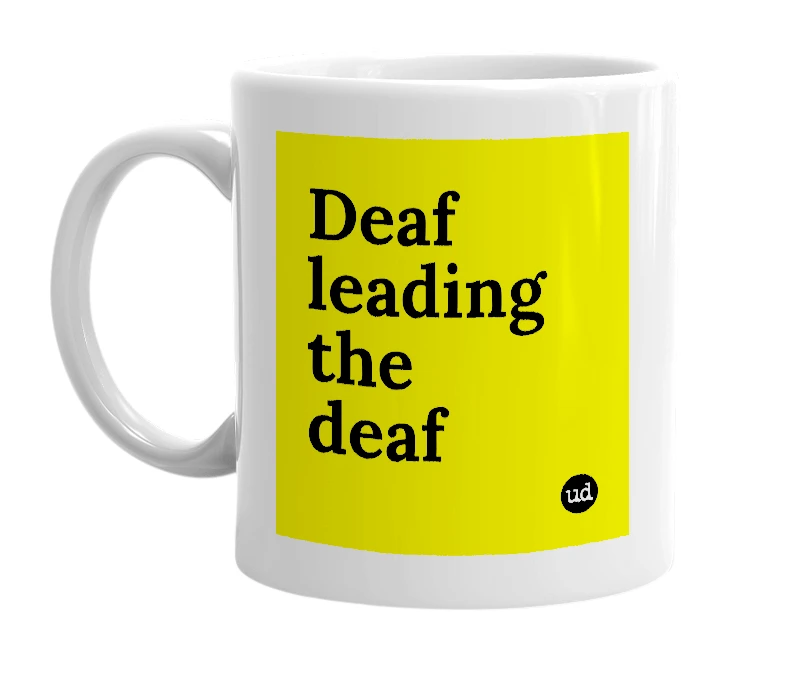 White mug with 'Deaf leading the deaf' in bold black letters